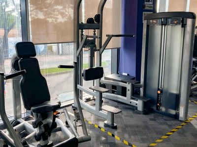 Sunlight falling on exercise equipment in a peaceful room.